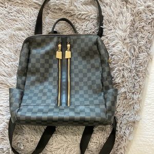 2-1 purse or backpack. Matching wristlet included